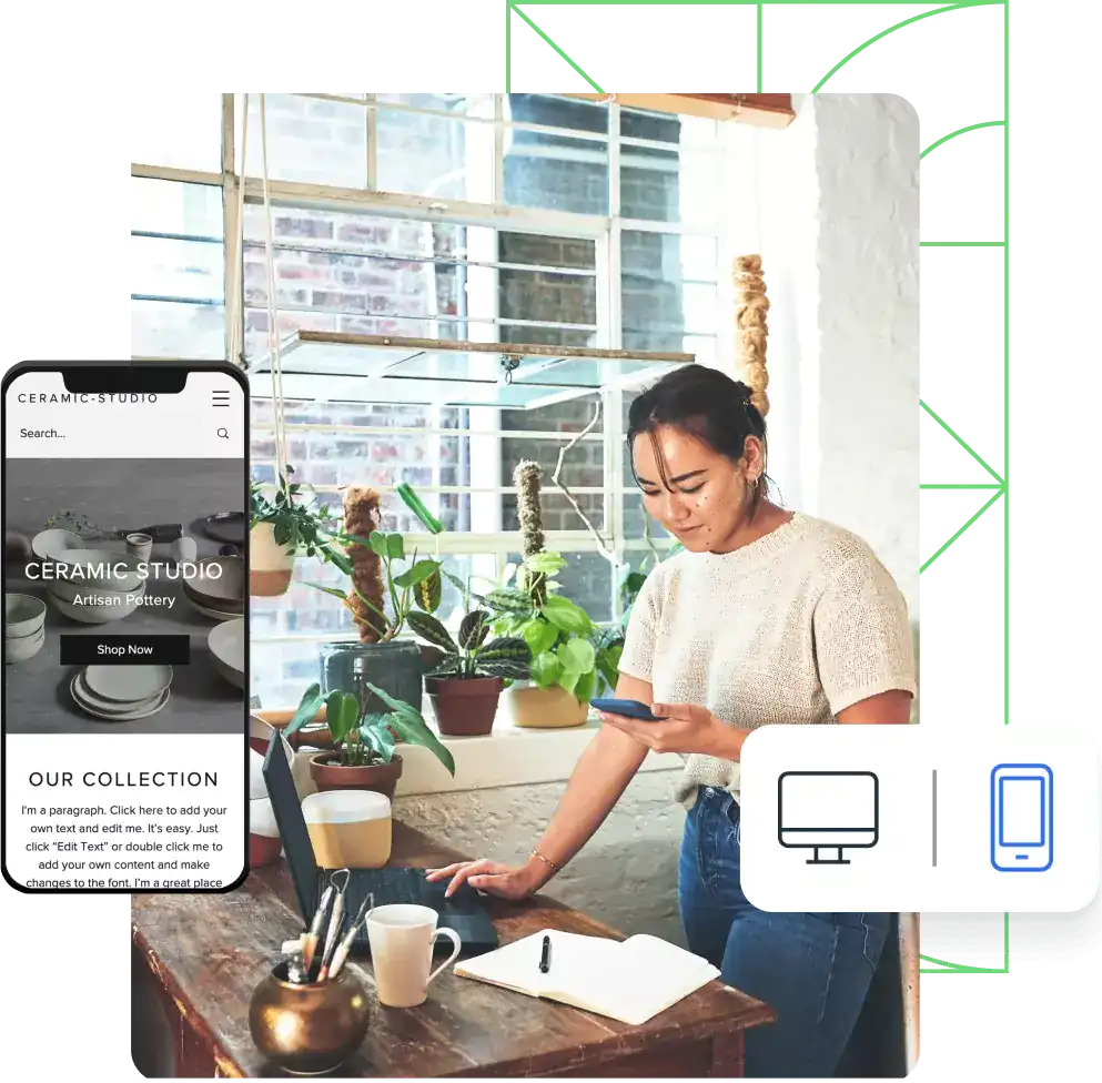 Woman stands at her desk looking at her phone with Wix website builder