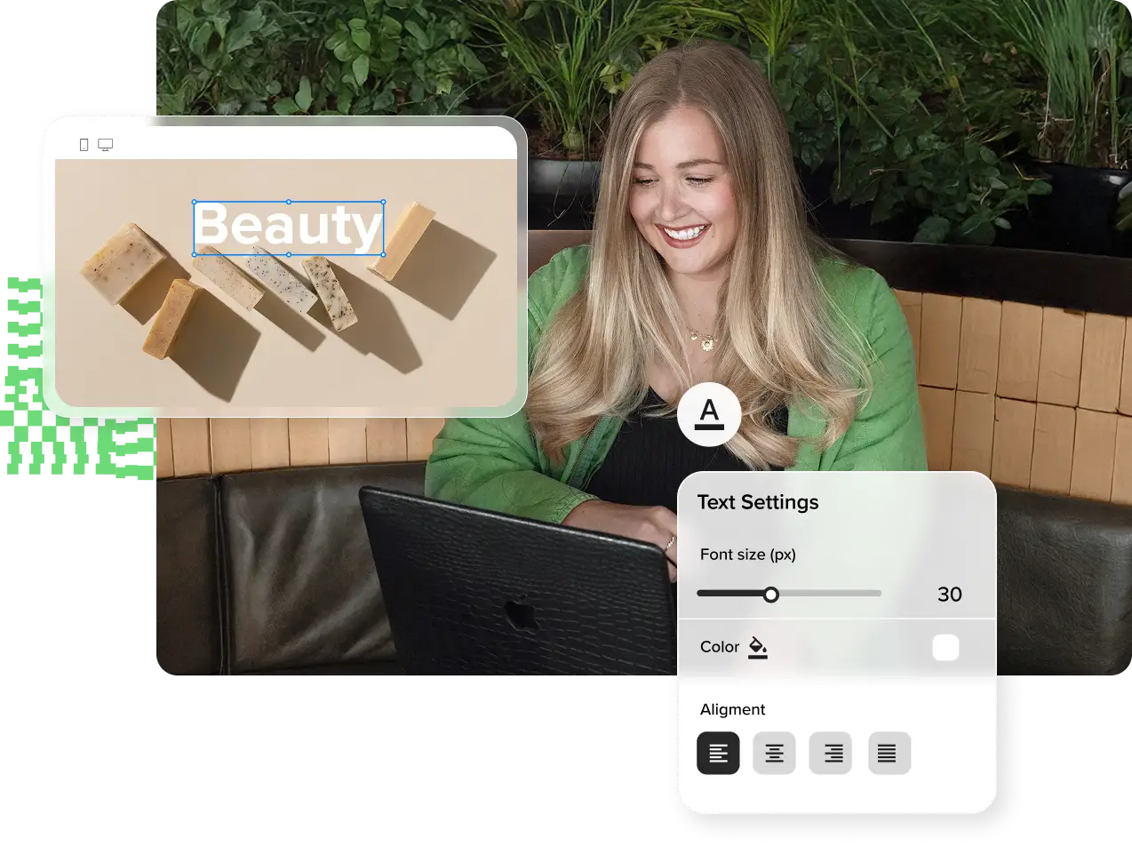 A woman is sitting outside on a bench surrounde by green plants while she smiles at her laptop.