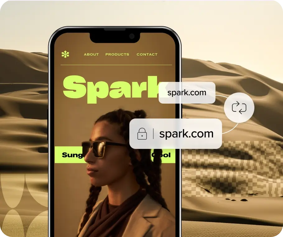 A screenshot of the Spark.com website shown on a mobile phone in front of a desert landscape.